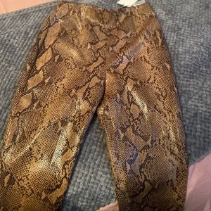 Snakeskin print leather skinny pants